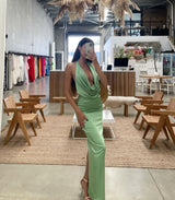 Alice Dress by Lexi, in kiwi green colour, deep cowl neckline, luxe satin fabric, halter tie-up back with adjustable strap, sleek straight fit with back split. Hire for weddings, special events, formal events, school balls.